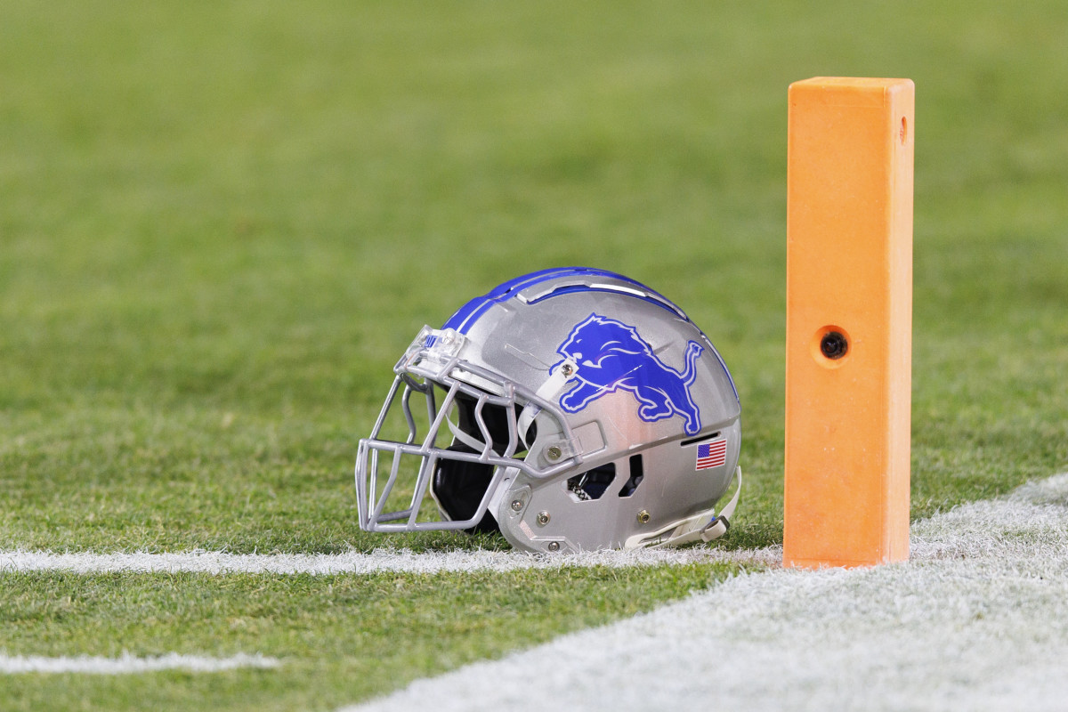 Green Bay, Wisconsin, USA; A Detroit Lions helmet sits on the field during warmups prior to the game against the Green Bay Packers at Lambeau Field