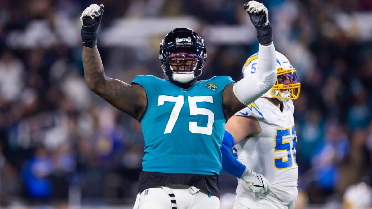 Jawaan Taylor of the Jacksonville Jaguars runs onto the field