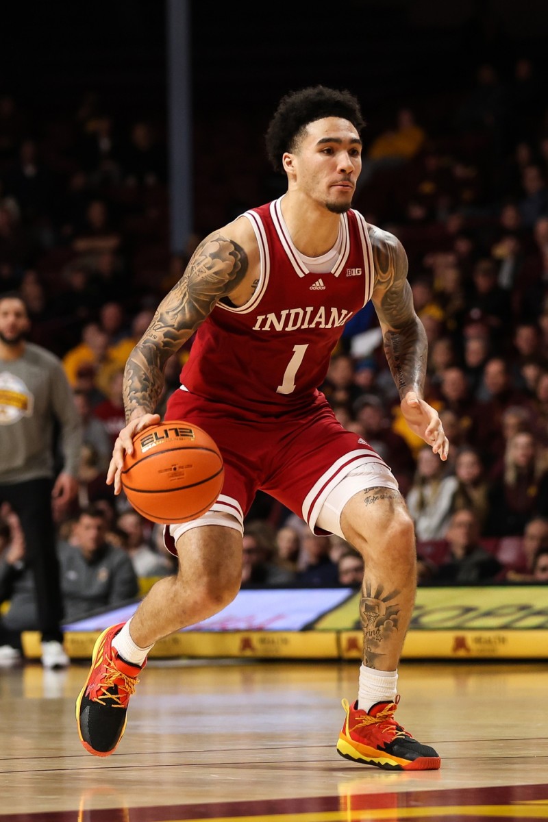 Jalen Hood-Schifino (1) dribbles against the Minnesota Golden Gophers during Wednesday's matchup.