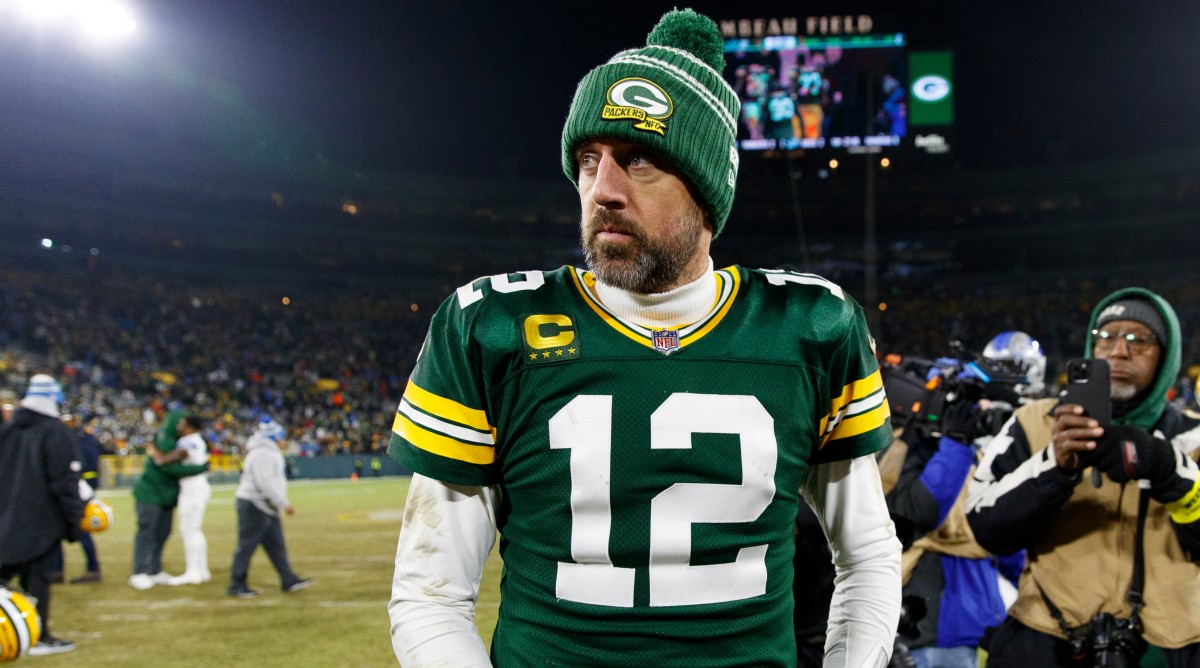 Packers quarterback Aaron Rodgers (12) looks into the distance following a game against the Lions.