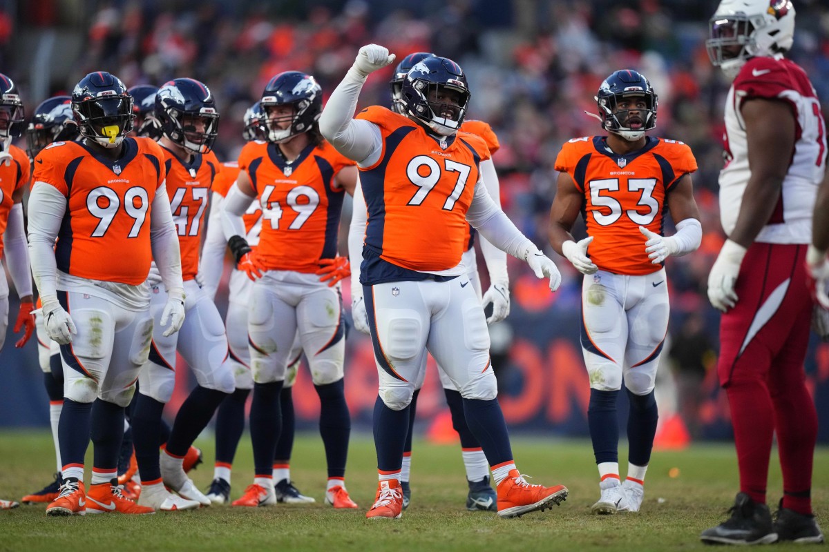 Denver Broncos defensive tackle D.J. Jones (97) reacts to a play in the second half against the Arizona Cardinals at Empower Field at Mile High.