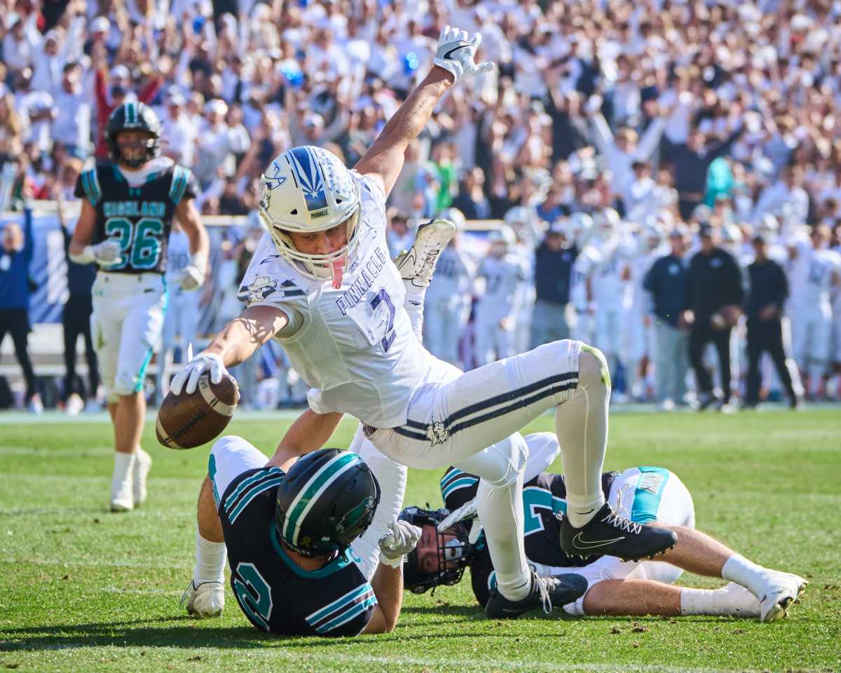 Pinnacle tight end Duce Robinson for the end zone during the Arizona 6A State Championship against the Highland Hawks.