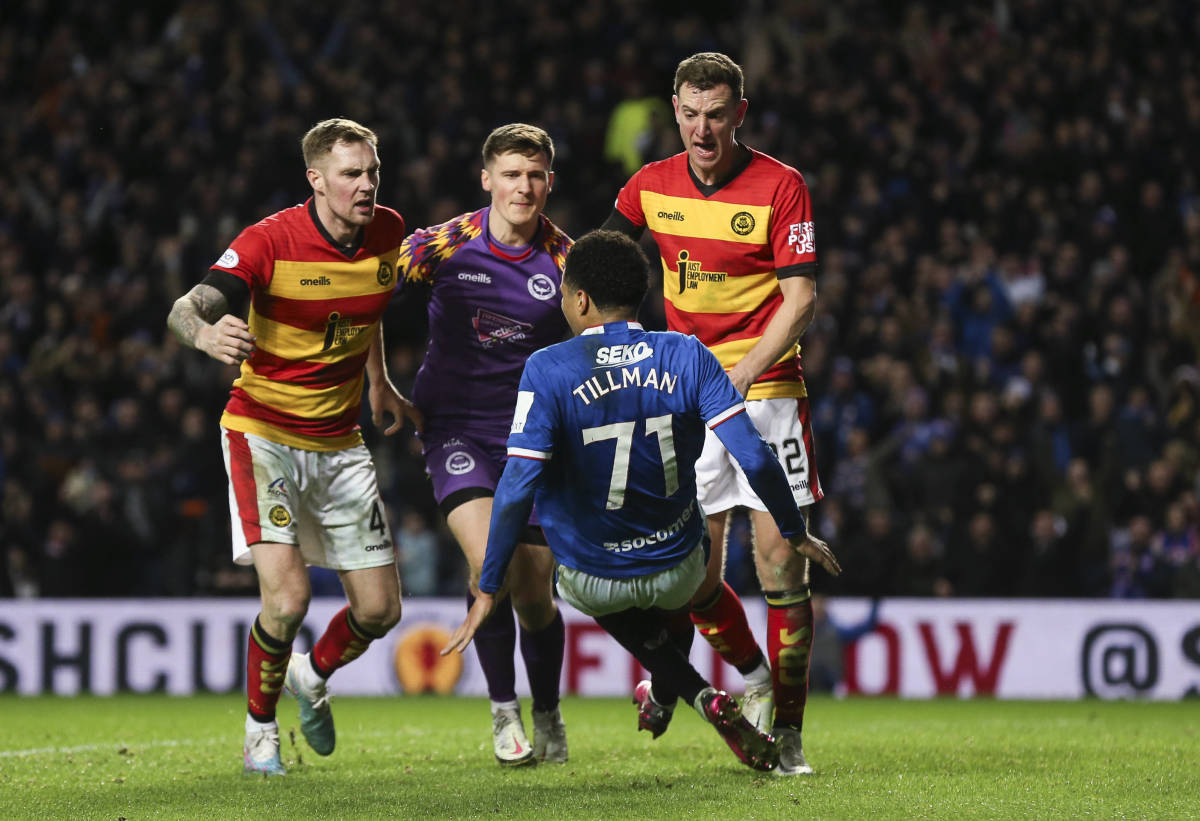 Rangers midfielder Malik Tillman pictured falling to the ground during an altercation with multiple players from Partick Thistle at Ibrox in February 2023