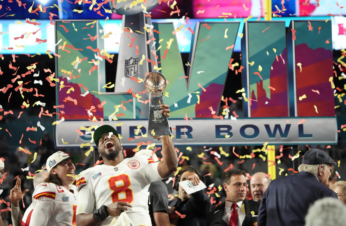 Kansas City Chiefs defensive end Carlos Dunlap (8) celebrates with the Lombardi Trophy after defeating the Philadelphia Eagles in Super Bowl LVII at State Farm Stadium in Glendale on Feb. 12, 2023. Nfl Super Bowl Lvii Kansas City Chiefs Vs Philadelphia Eagles