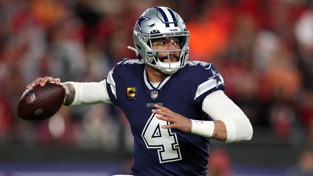 Cowboys quarterback Dak Prescott winds up to throw.