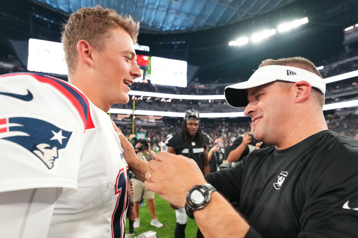 Jones and McDaniels meet after a game.