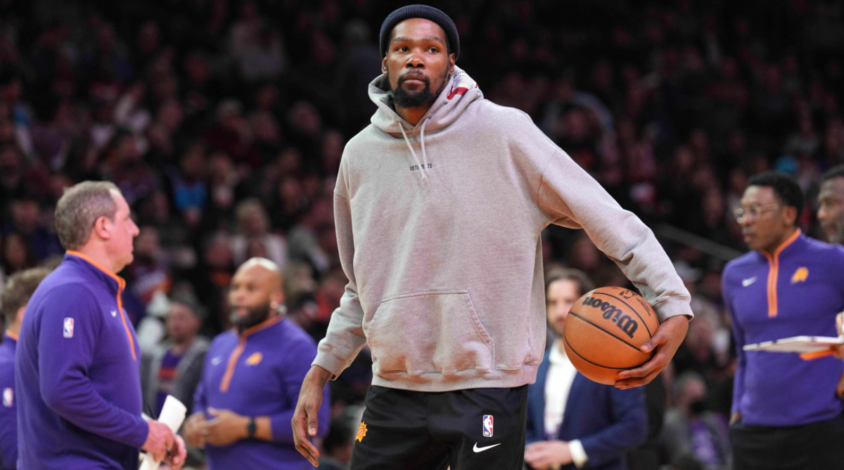 Feb 14, 2023; Phoenix, Arizona, USA; Phoenix Suns forward Kevin Durant looks on against the Sacramento Kings during the first half at Footprint Center. Mandatory Credit: Joe Camporeale-USA TODAY Sports