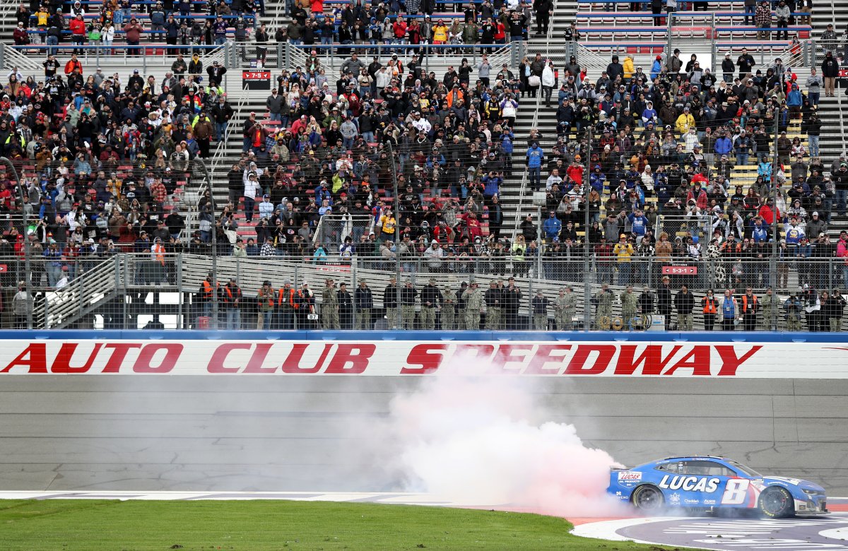 In what could very well be the first of several times this season, Kyle Busch celebrates with a major burnout after winning Sunday's NASCAR Cup race at Auto Club Speedway. (Photo by Meg Oliphant/Getty Images)