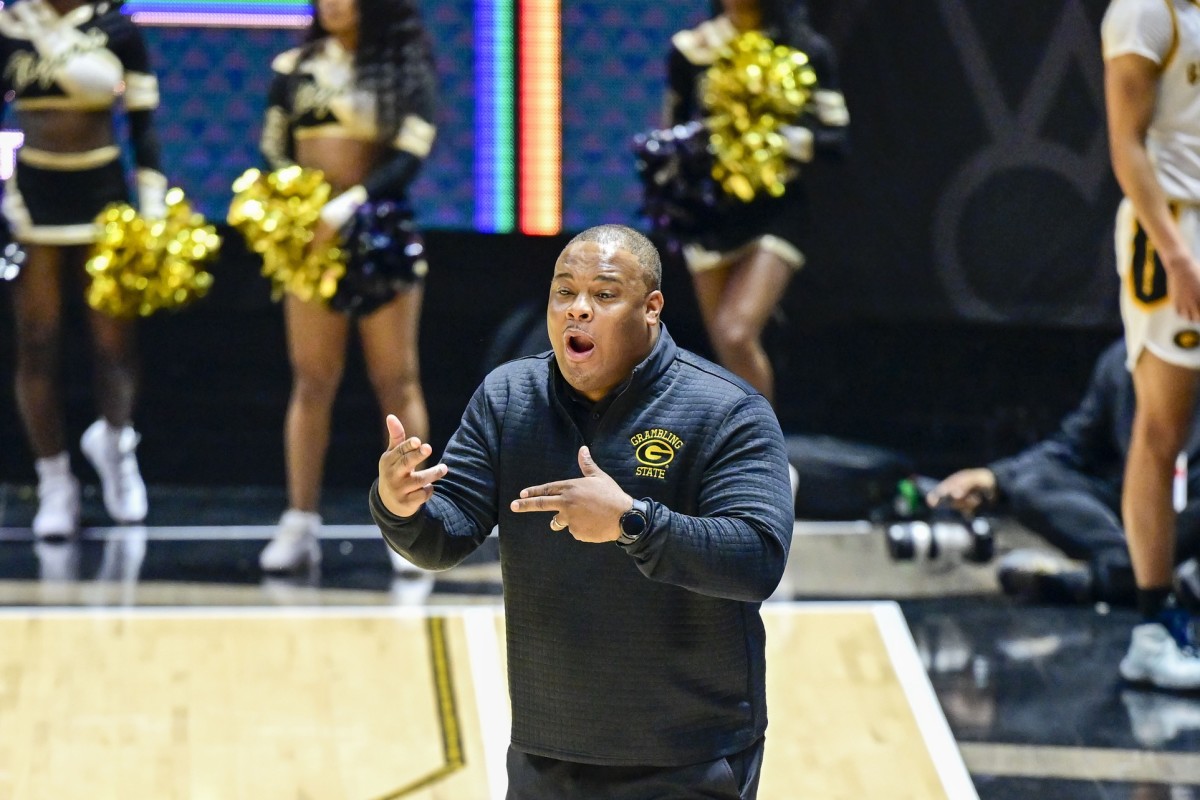 Grambling State University Tigers head coach Donte' Jackson makes a call against the Southern University Jaguars