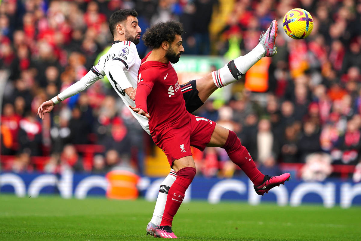 Bruno Fernandes pictured (left) competing for the ball with Mo Salah during Manchester United's 7-0 defeat at Liverpool in March 2023