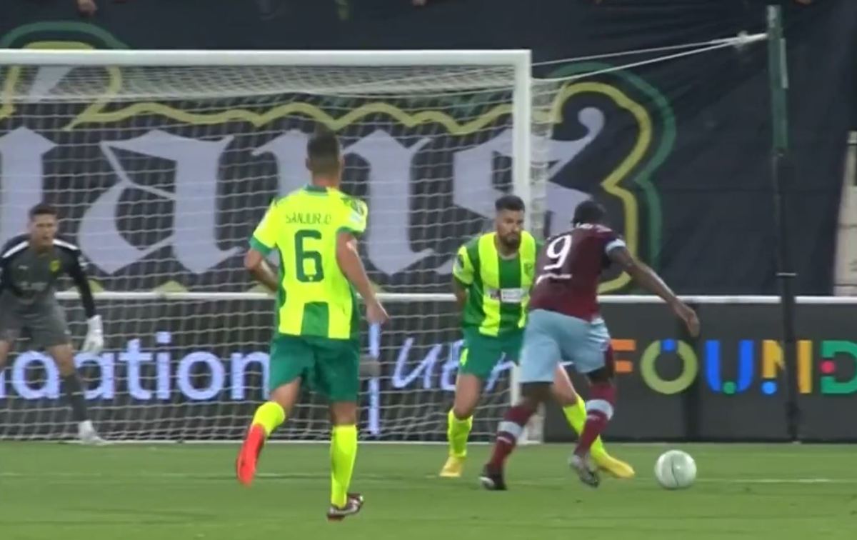 Michail Antonio pictured (right) moments before scoring a brilliant goal for West Ham against AEK Larnaca in March 2023