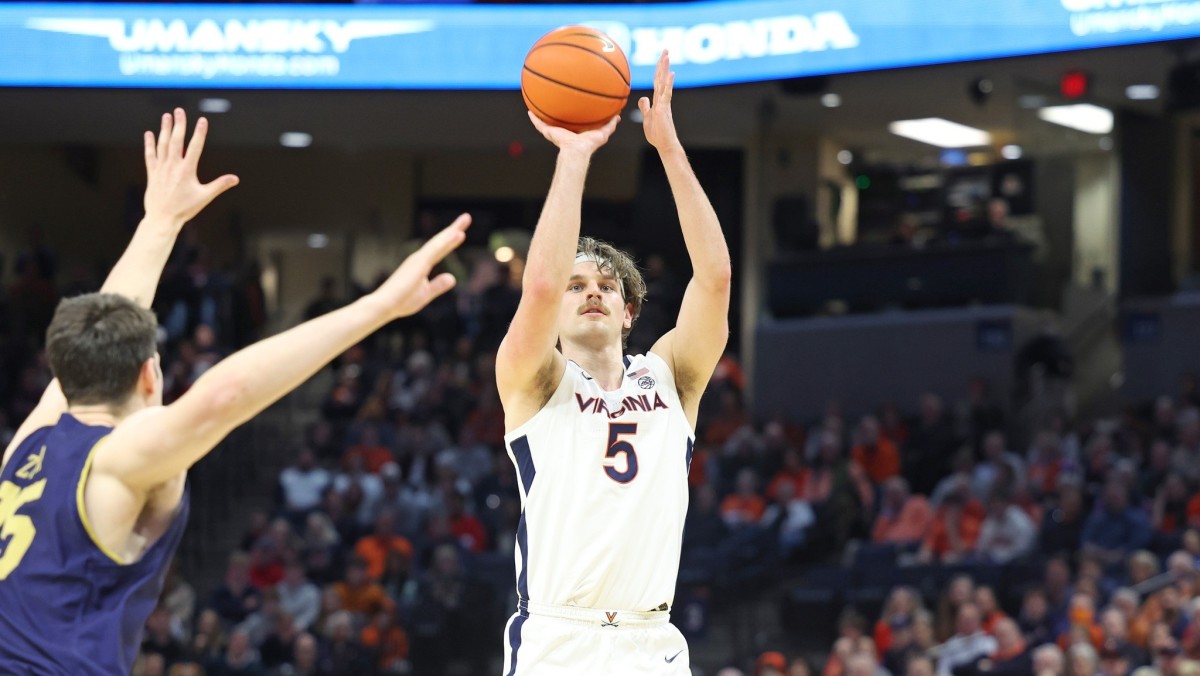 Ben Vander Plas attempts a three-pointer during the Virginia men's basketball game against Notre Dame at John Paul Jones Arena.