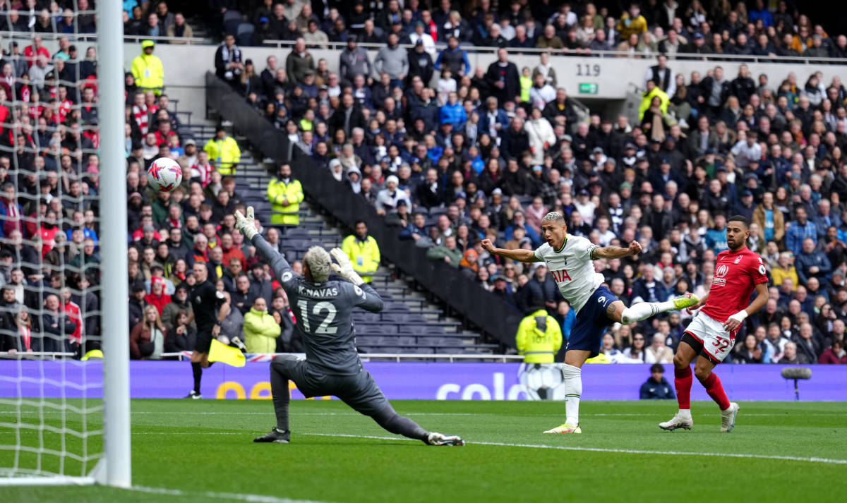 Richarlison pictured (center) shooting during Tottenham's Premier League game against Nottingham Forest in March 2023