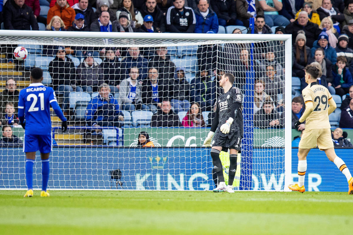 Chelsea forward Kai Havertz pictured (right) watching on after beating Leicester goalkeeper Danny Ward (center) with a first-time lob during a Premier League game in March 2023