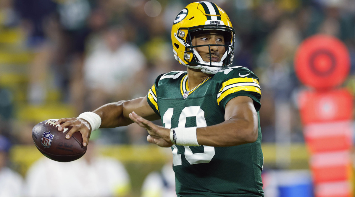 Green Bay Packers quarterback Jordan Love throws a football