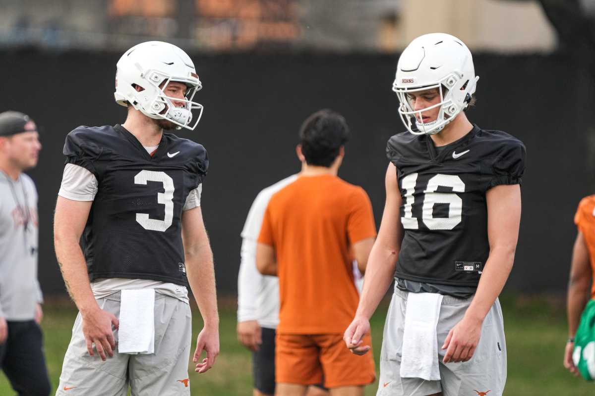 Texas quarterbacks Arch Manning (16) and Quinn Ewers talk during the team's first spring practice of 2023 at the Frank Denius Fields. 2023-03-06-manning-ewers