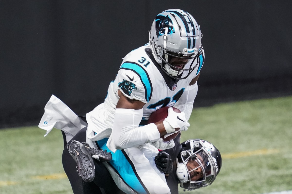 Oct 11, 2020; Carolina Panthers safety Juston Burris (31) intercepts a pass against Atlanta Falcons wide receiver Russell Gage (83). Mandatory Credit: Dale Zanine-USA TODAY 