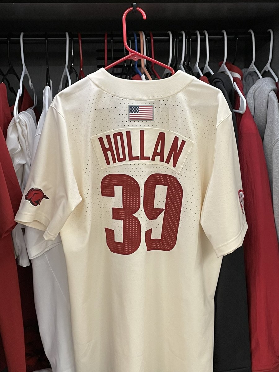 Hunter Hollan's jersey hangs in his locker.