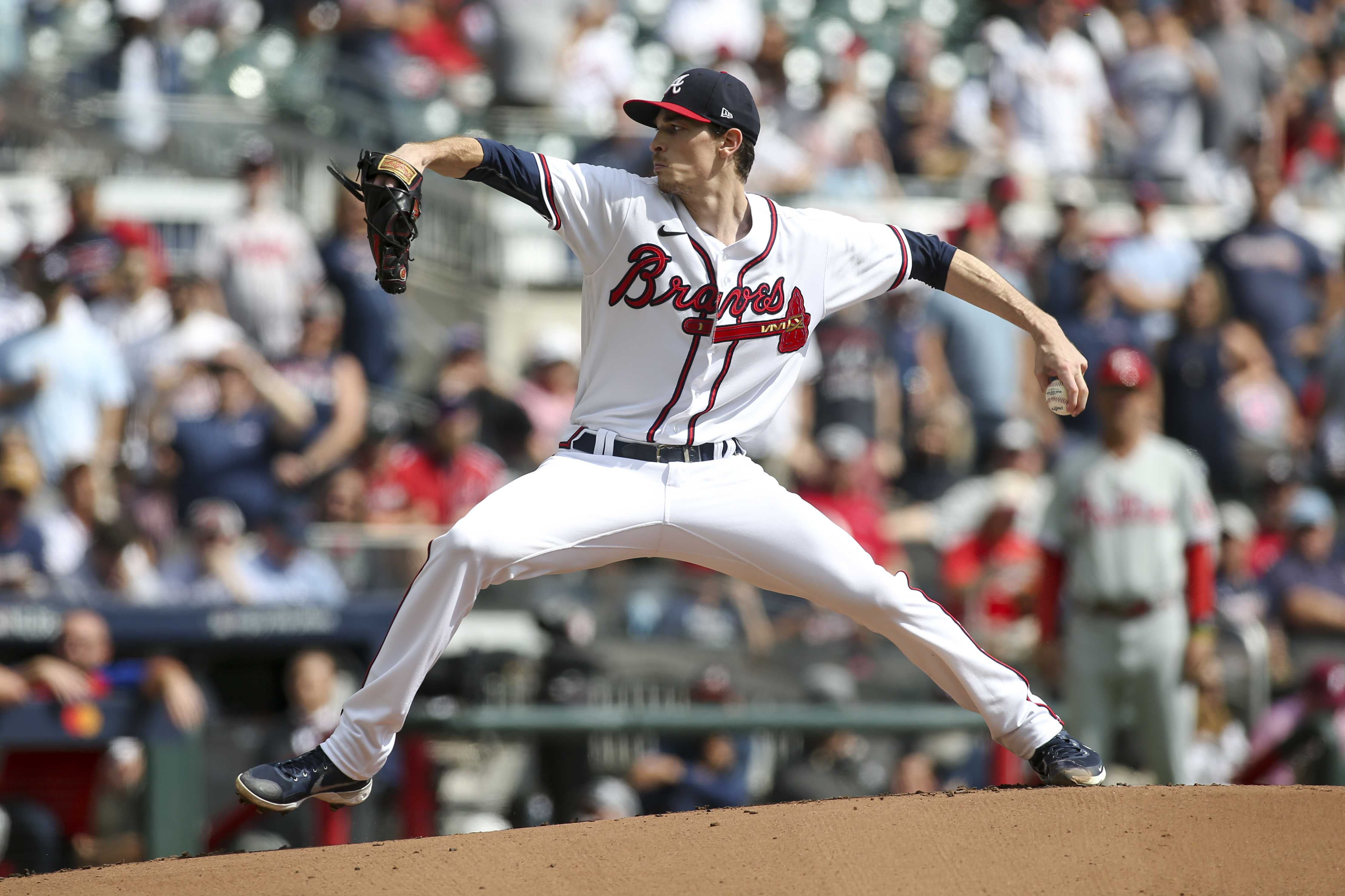 Max Fried and Kevin Pillar of the Atlanta Braves smile during