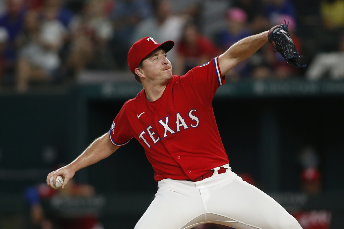 Texas Rangers starting pitcher Josh Sborz (66) throws a pitch in the first inning against the Seattle Mariners at Globe Life Field.