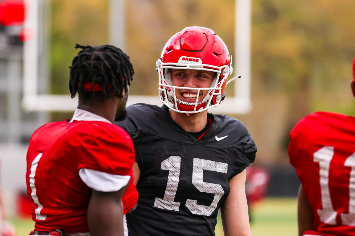 Carson Beck Talks to Marcus Rosemy-Jacksaint at Practice Credit: Tony Walsh/UGAAA