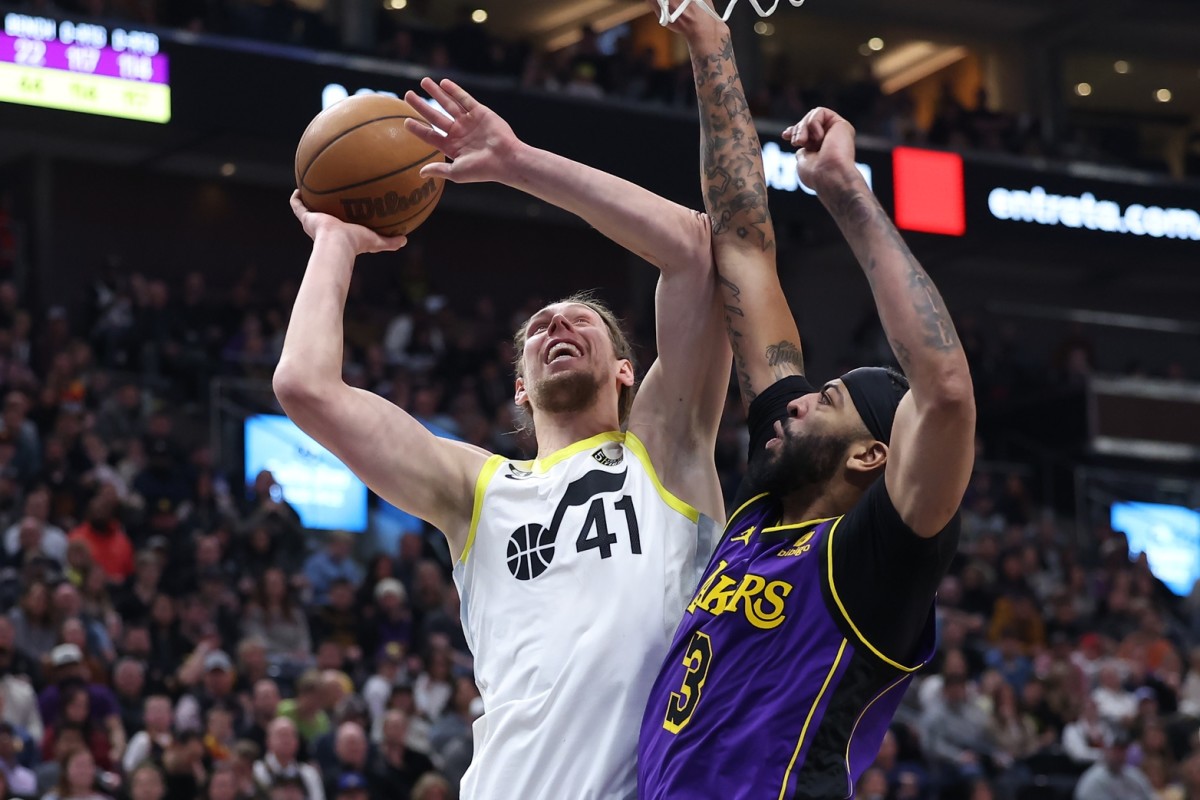 Utah Jazz forward Kelly Olynyk (41) goes to the basket against Los Angeles Lakers forward Anthony Davis (3) in the third quarter at Vivint Arena.