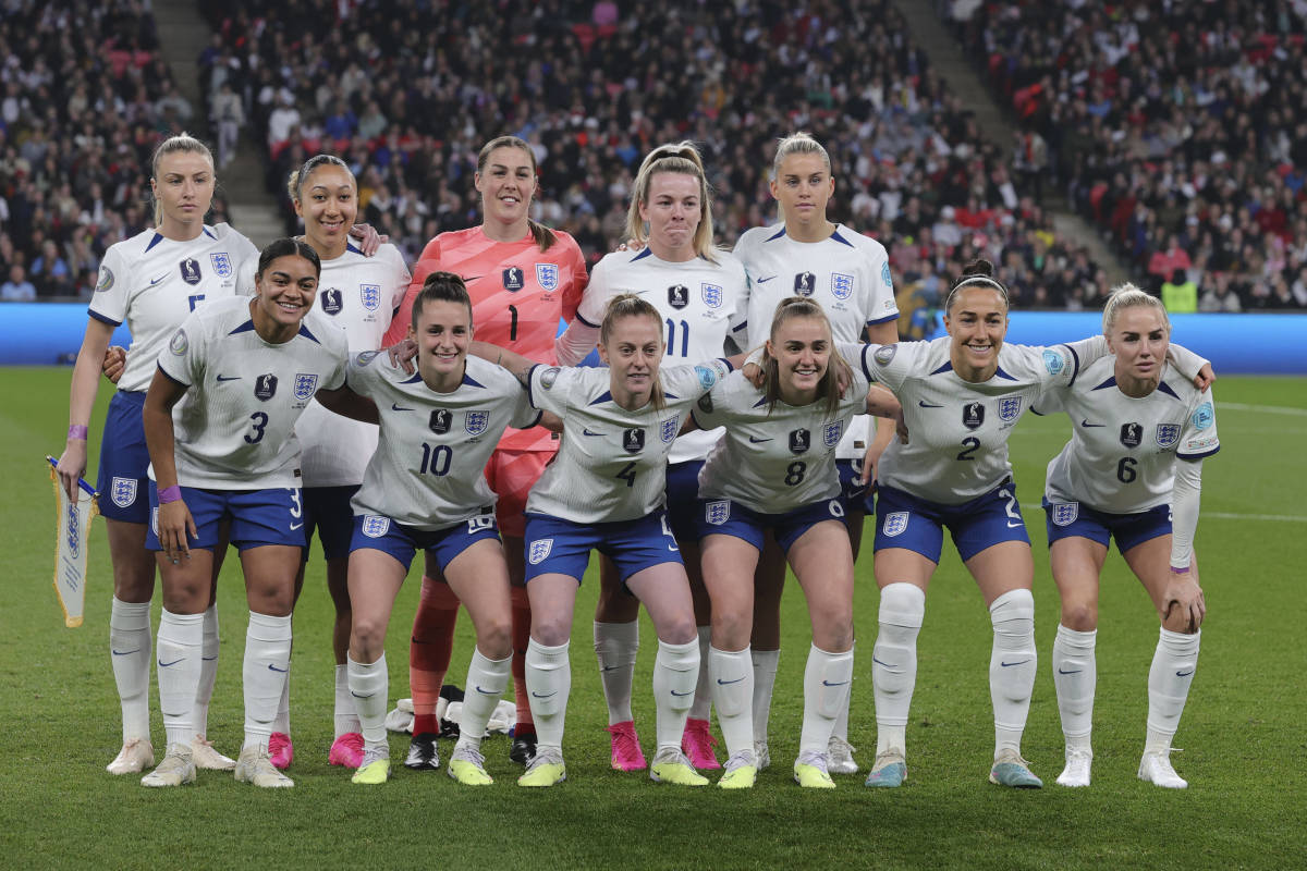 England's players pictured posing for a team photo ahead of the first ever Women's Finalissima game, against Brazil at Wembley Stadium in April 2023