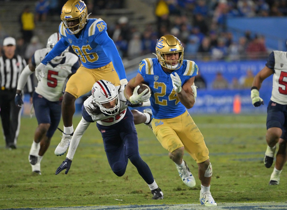 Nov 12, 2022; UCLA Bruins running back Zach Charbonnet (24) carries the ball against the Arizona Wildcats. Mandatory Credit: Jayne Kamin-Oncea-USA TODAY