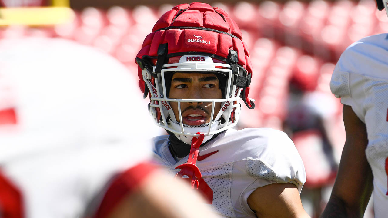 Hogs' running back AJ Green, wide receiver Isaiah Sategana after practice 