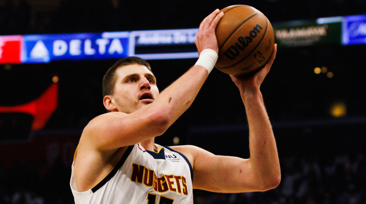 Nuggets center Nikola Jokic goes up for a lay-up during a game in 2022.