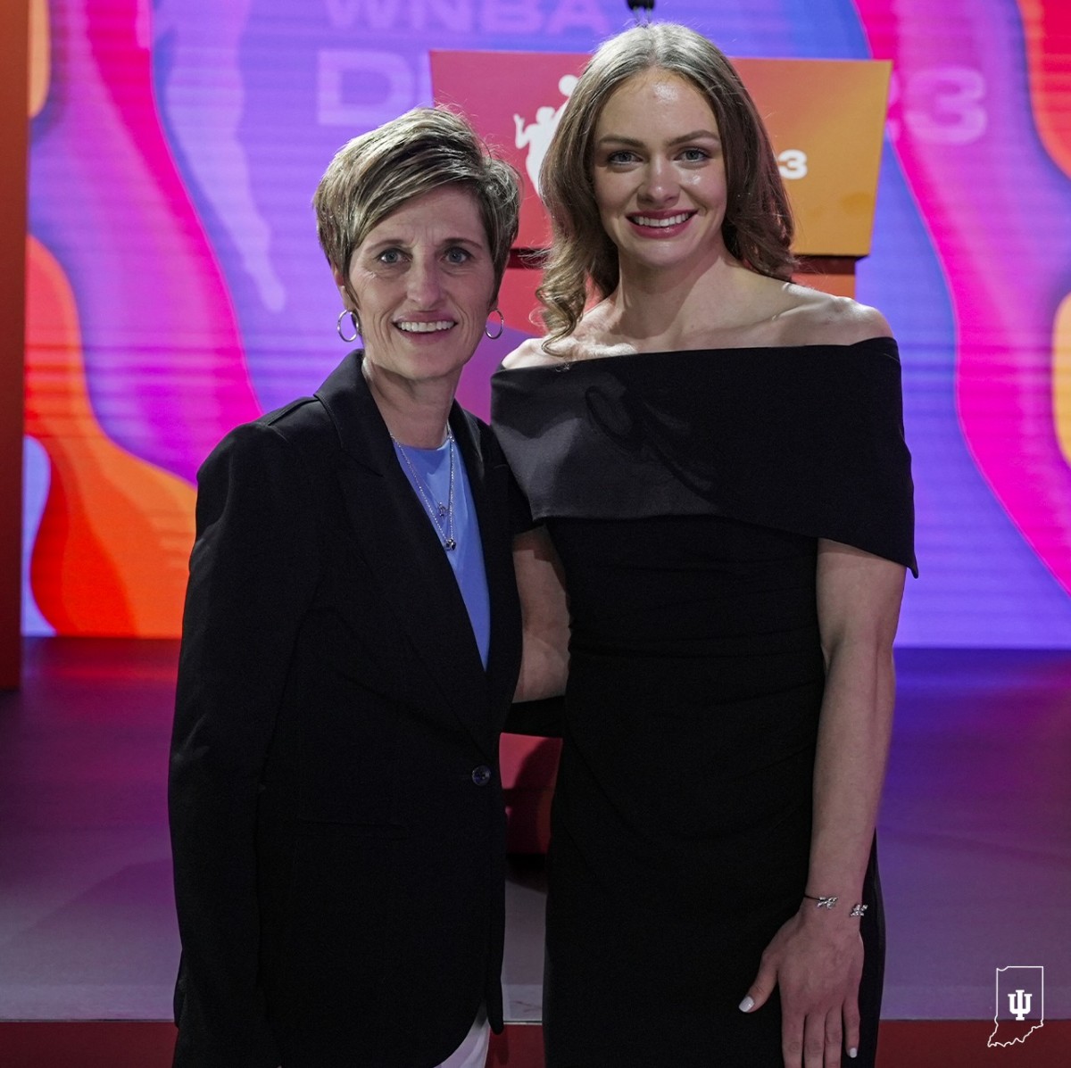 Indiana women's basketball coach Teri Moren stands alongside her former player Grace Berger at the 2023 WNBA draft in New York City.