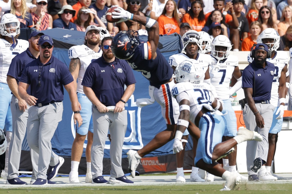 Sep 17, 2022; Charlottesville, Virginia, USA; Virginia Cavaliers wide receiver Dontayvion Wicks (3) catches a pass as Old Dominion Monarchs cornerback Tobias Harris (20) defends during the second quarter at Scott Stadium. Mandatory Credit: Geoff Burke-USA TODAY Sports