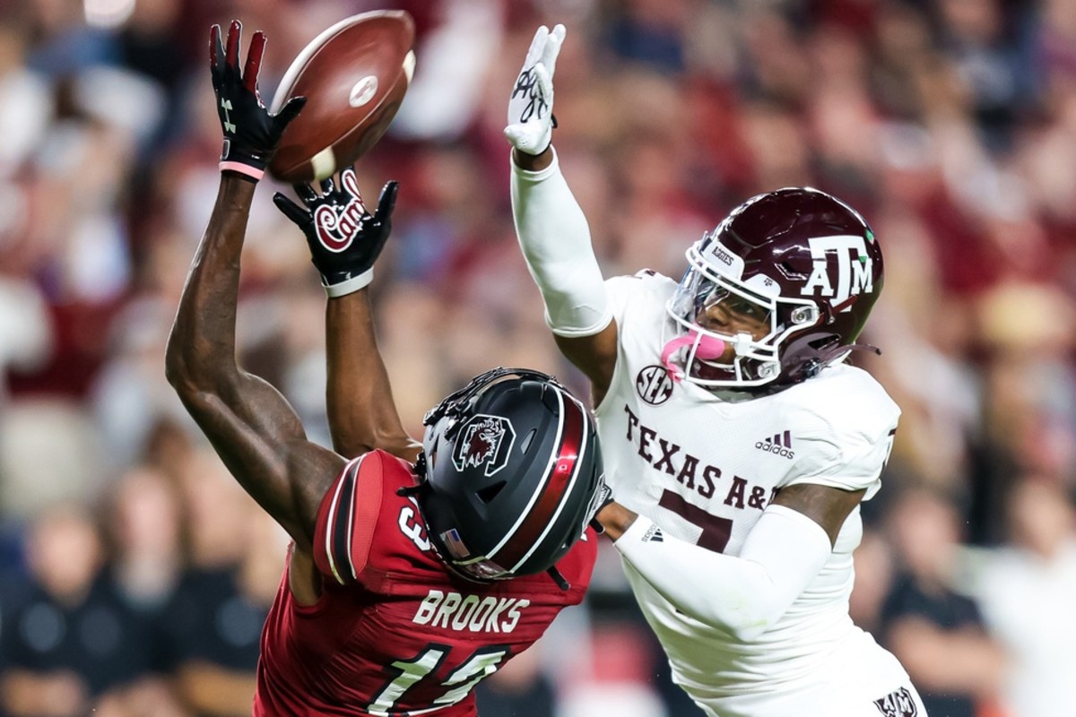 Oct 22, 2022; Columbia, South Carolina, USA; South Carolina Gamecocks wide receiver Jalen Brooks (13) cannot come up with the reception as Texas A&M Aggies defensive back Tyreek Chappell (7) defends in the second quarter at Williams-Brice Stadium. Mandatory Credit: Jeff Blake-USA TODAY Sports