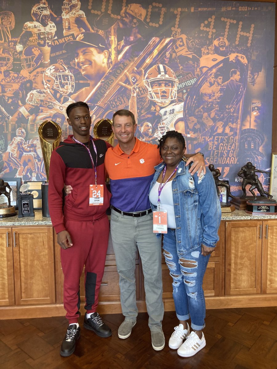 Corian Gipson pictured with Clemson head football coach Dabo Swinney