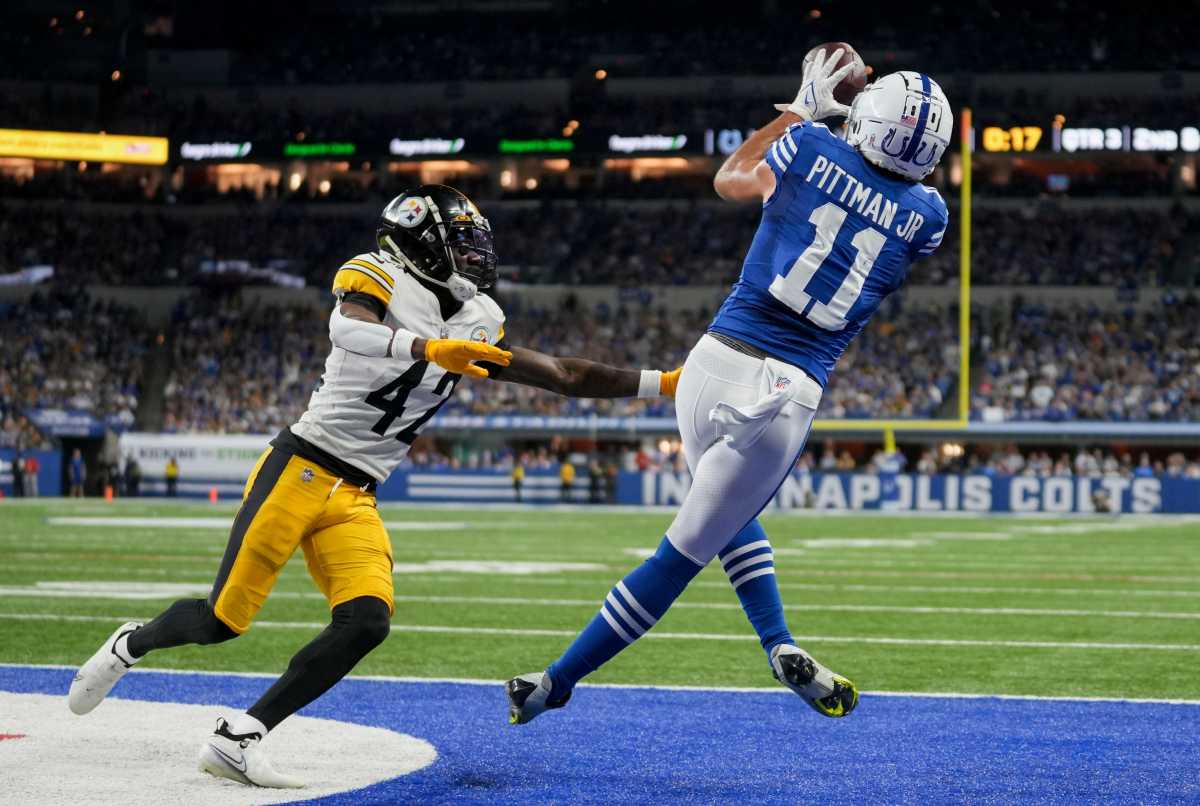 Indianapolis Colts wide receiver Michael Pittman Jr. (11) makes a catch in the end zone for a touchdown as Pittsburgh Steelers cornerback James Pierre (42) moves in Monday, Nov. 28, 2022, during a game against the Pittsburgh Steelers at Lucas Oil Stadium in Indianapolis.