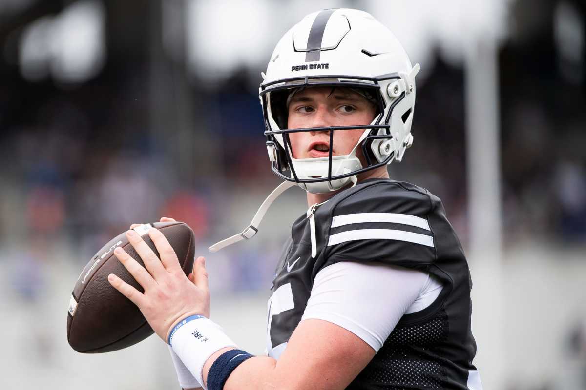 Penn State quarterback Drew Allar lines up at pass at the Nittany Lions' 2023 Blue-White Game.