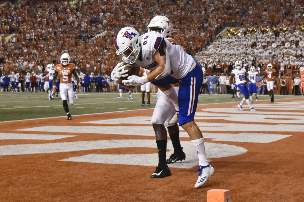 Aug 31, 2019; Austin, TX, USA; Louisiana Tech Bulldogs wide receiver Griffin Hebert (80) catches a touchdown pass in the second half of a game against the Texas Longhorns at Darrell K Royal-Texas Memorial Stadium. Mandatory Credit: Scott Wachter-USA TODAY Sports