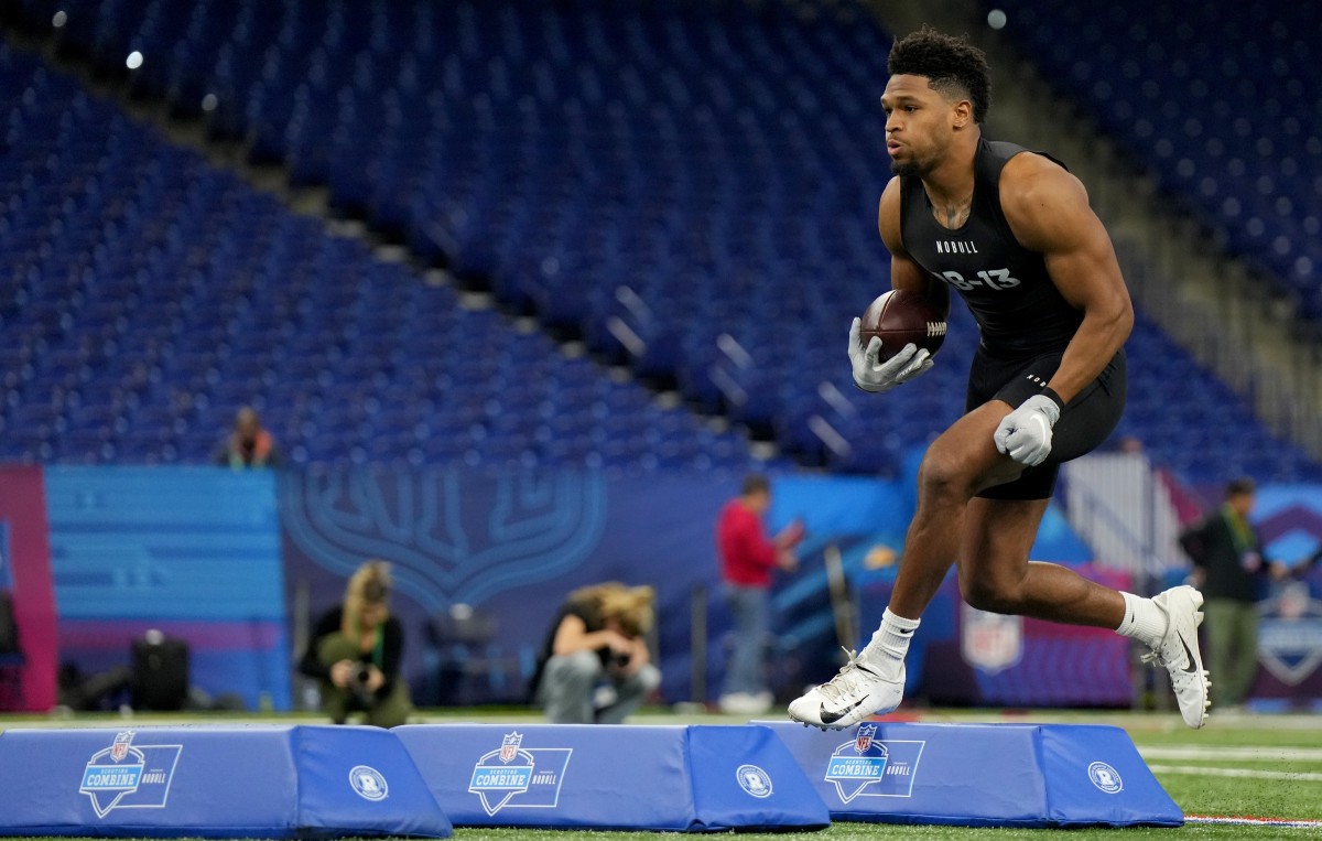 Mar 5, 2023; Indianapolis, IN, USA; Texas running back Roschon Johnson (RB13) during the NFL Scouting Combine at Lucas Oil Stadium. Mandatory Credit: Kirby Lee-USA TODAY Sports