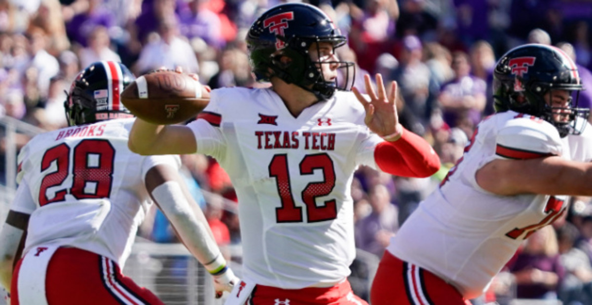 Texas Tech Red Raiders quarterback Tyler Shough attempts a pass in a college football game in the Big 12.