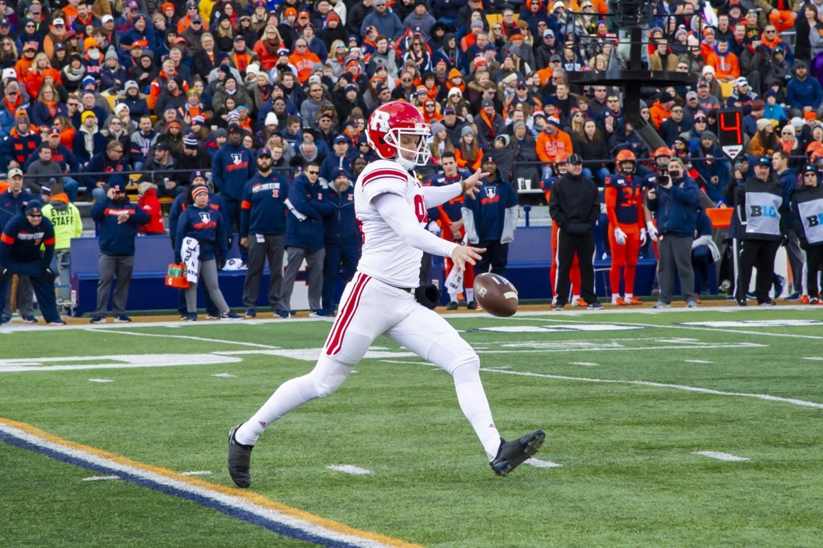 Nov 2, 2019; Champaign, IL, USA; Rutgers Scarlet Knights punter Adam Korsak (94) punts the ball during the first half against the Illinois Fighting Illini at Memorial Stadium. Mandatory Credit: Patrick Gorski-USA TODAY Sports