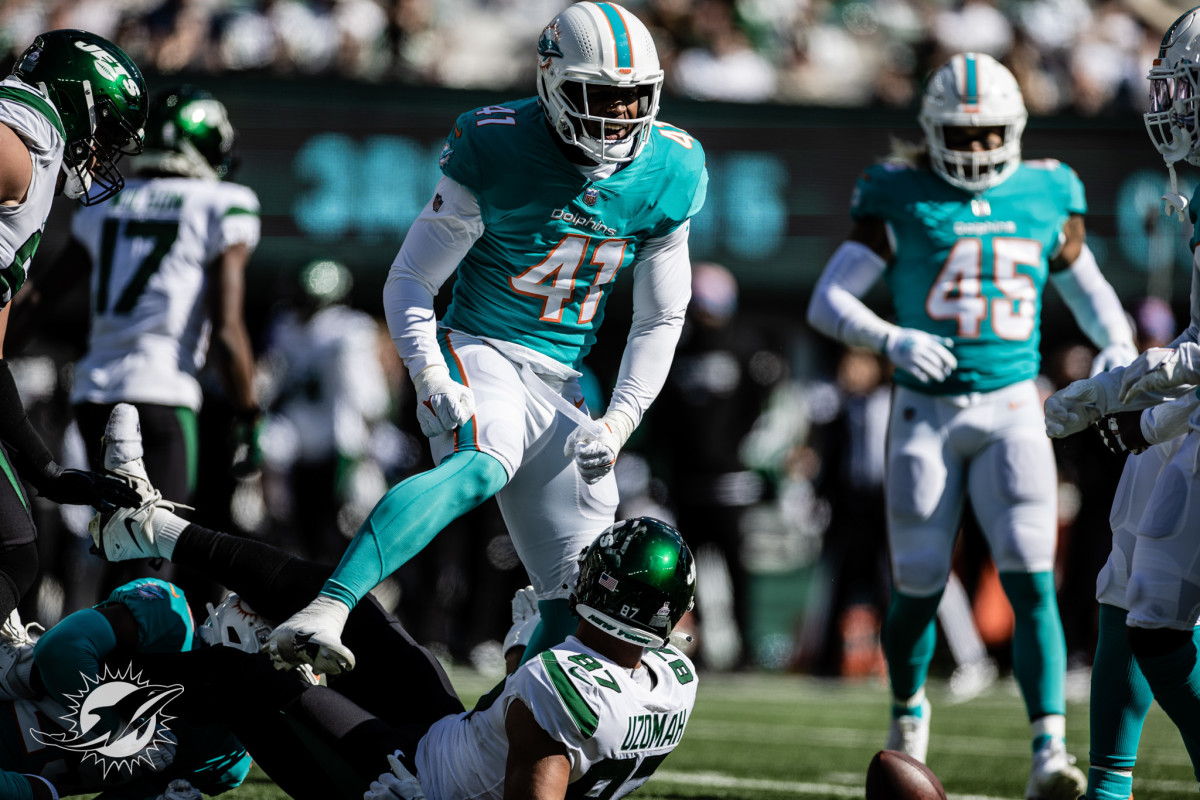 Miami Dolphins linebacker Channing Tindall (41) at the line of scrimmage  during the first half of an NFL football game against the New England  Patriots on Sunday, Sept. 17, 2023, in Foxborough