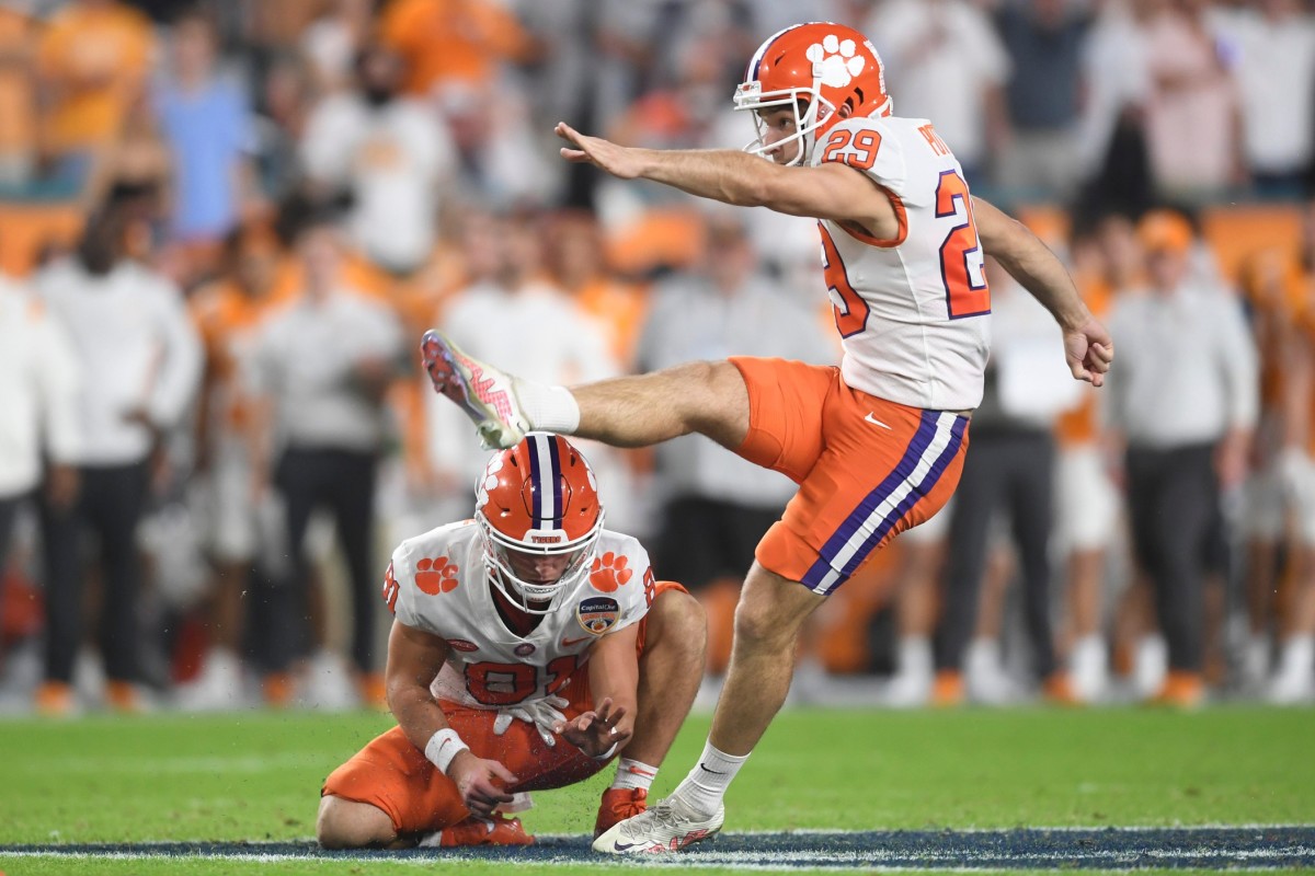 Clemson place kicker/punter B.T. Potter (29) kicks the ball during the first half of the Orange Bowl game between the Tennessee Vols and Clemson Tigers at Hard Rock Stadium in Miami Gardens, Fla. on Friday, Dec. 30, 2022. Orangebowl1230 2207