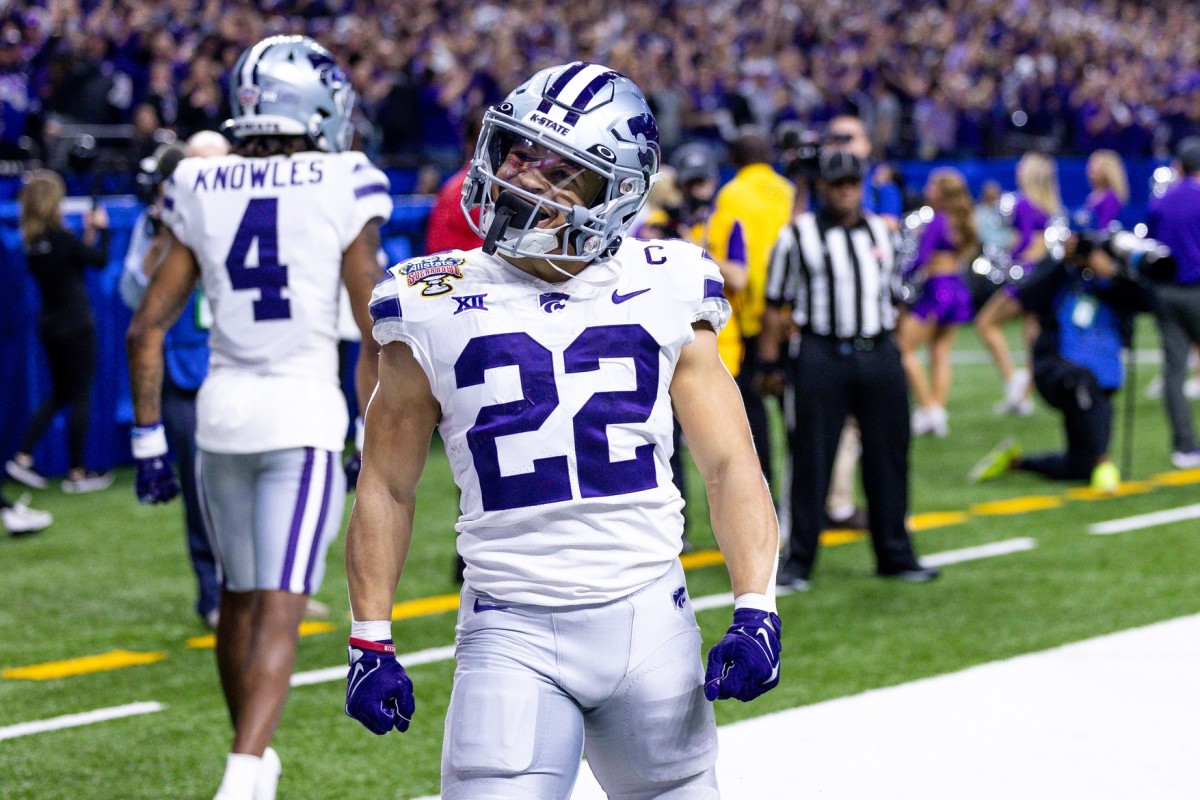 Dec 31, 2022; New Orleans, LA, USA; Kansas State Wildcats running back Deuce Vaughn (22) celebrates his touchdown scored against the Alabama Crimson Tide during the first half in the 2022 Sugar Bowl at Caesars Superdome. Mandatory Credit: Stephen Lew-USA TODAY Sports