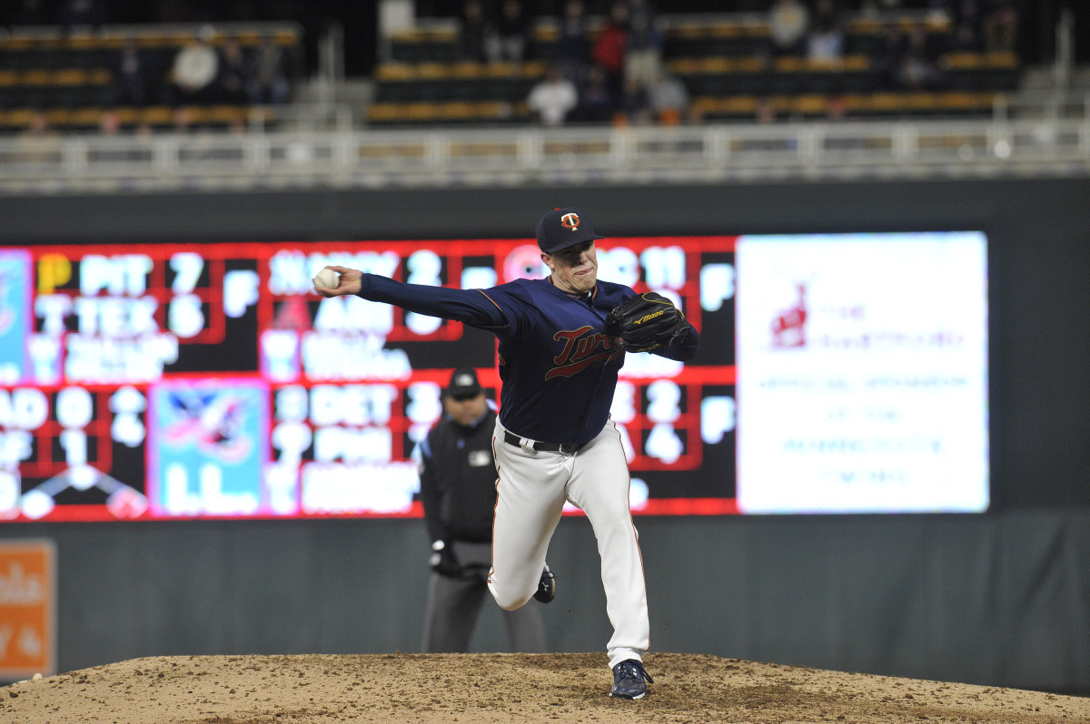 Minnesota Twins pitcher Trevor Hildenberger delivers a pitch during the ninth inning against the Houston Astros. (2019)