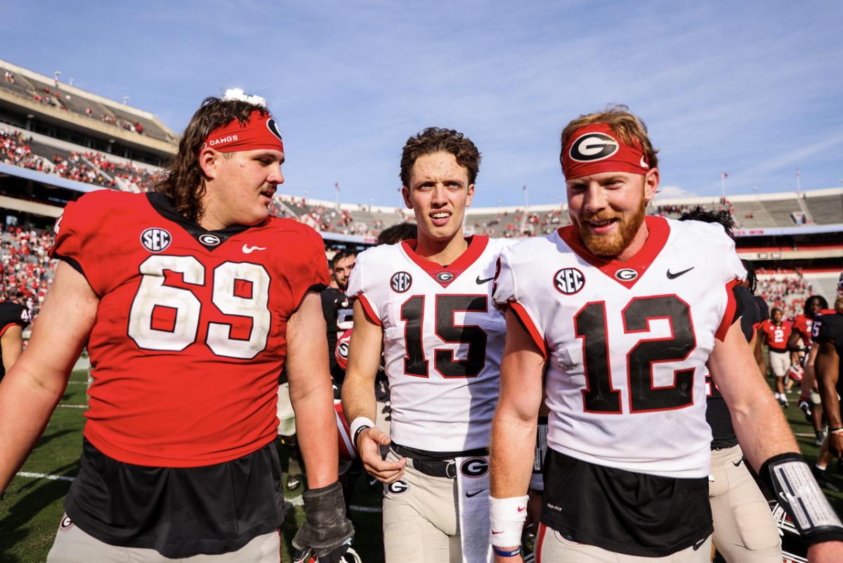 Georgia offensive lineman Tate Ratledge (69), Georgia quarterback Carson Beck (15), Georgia quarterback Brock Vandagriff (12) after Georgia’s annual G-Day scrimmage on Dooley Field at Sanford Stadium in Athens, Ga., on Saturday, April 15, 2023. (Tony Walsh/UGAAA)