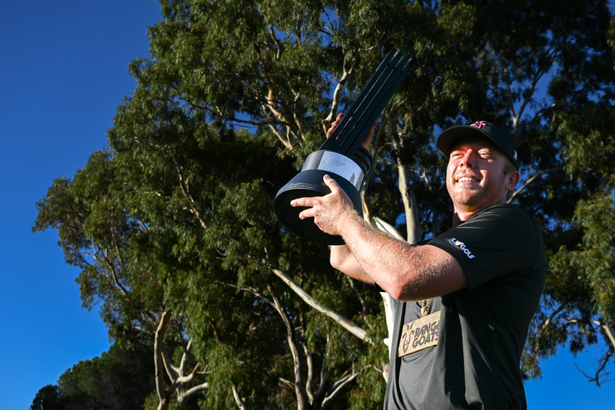 Talor Gooch of RangeGoats GC poses for a photo with his trophy after winning Liv Golf Adelaide at The Grange Golf Course on April 23, 2023 in Adelaide, Australia.