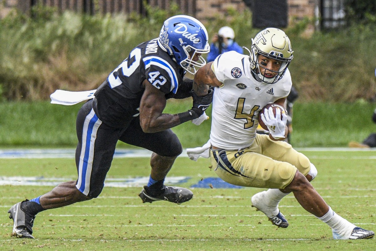 Duke Blue Devils linebacker Shaka Heyward (42) tackles Georgia Tech running back Dontae Smith (4). Mandatory Credit: William Howard-USA TODAY Sports at Wallace Wade Stadium