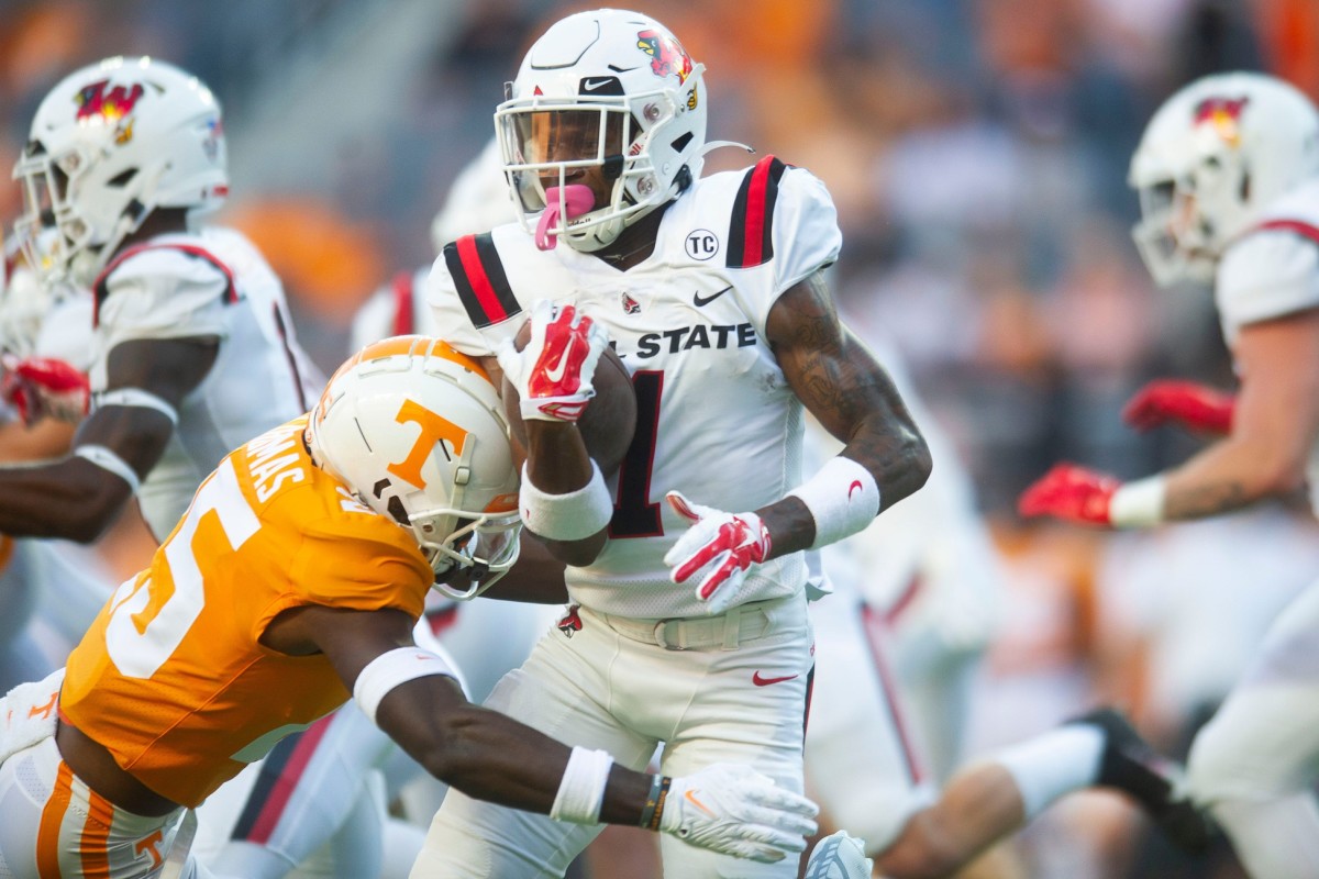 Ball State cornerback Nic Jones (1) is tackled by Tennessee defensive back Jourdan Thomas (25) during football game between Tennessee and Ball State at Neyland Stadium in Knoxville, Tenn. on Thursday, Sept. 1, 2022. Kns Utvbs0901