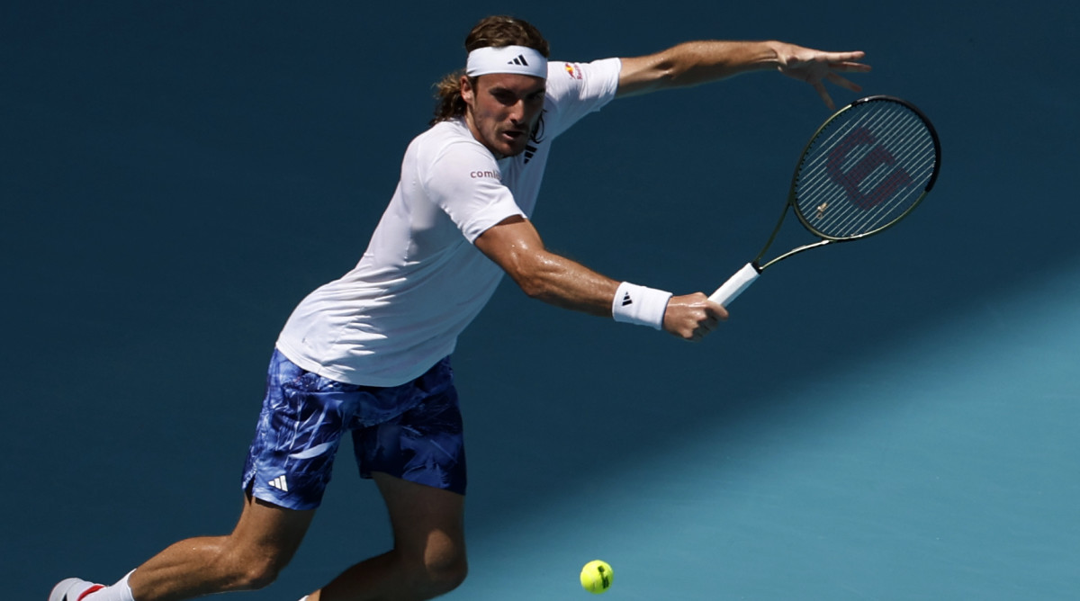 Stefanos Tsitsipas hits a backhand at the 2023 Miami Open