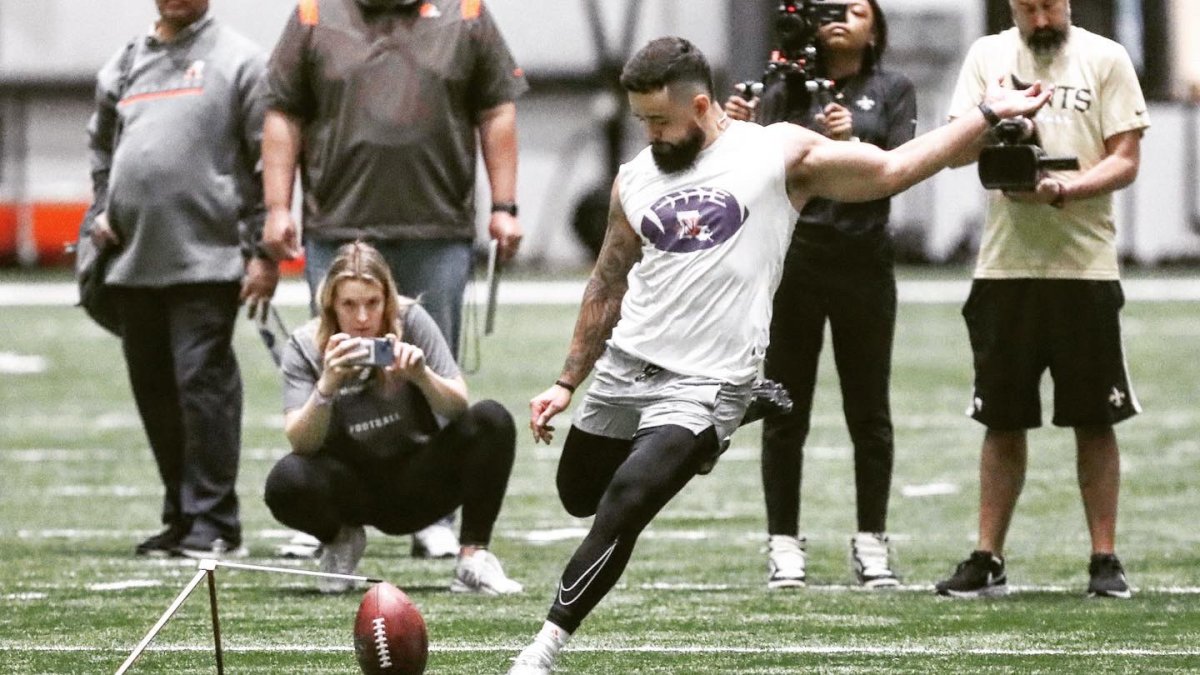 Eddie Godina boots field goals while NFL scouts look on at Louisiana Pro Day.